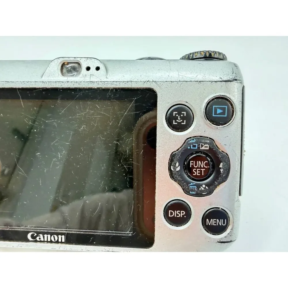 Canon PowerShot A1200 12.1MP Digital Camera Silver AS-IS Broken Battery Door